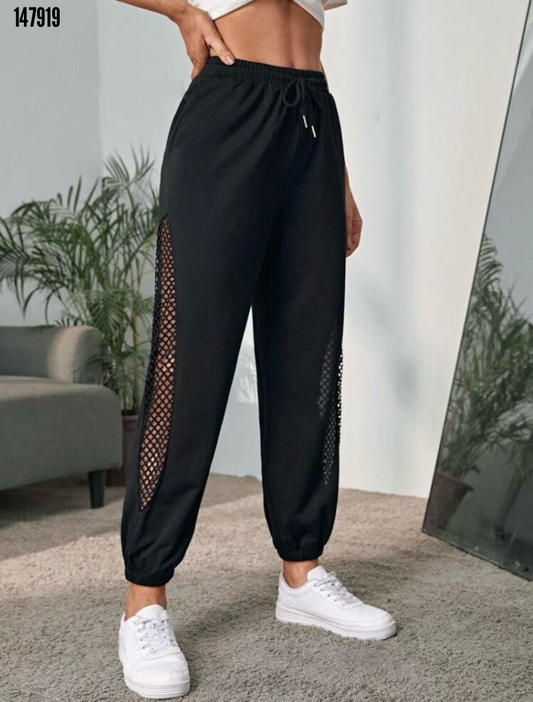 Kadın yüksek bel yanı kuşgözu transparan detay eşofman altı